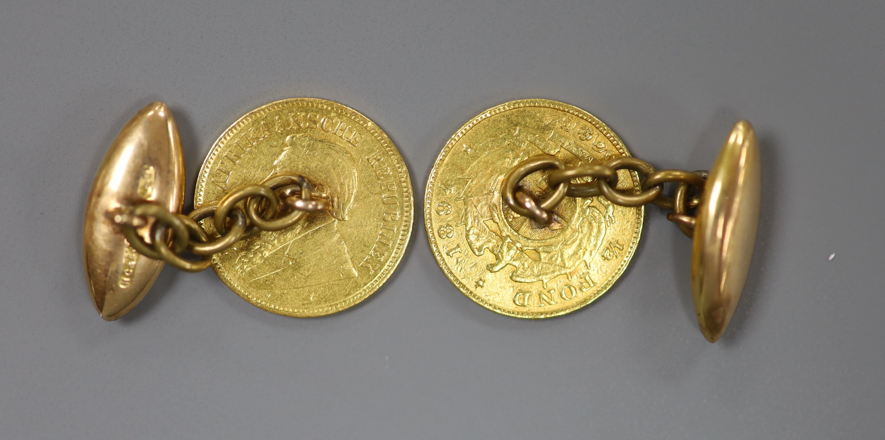 A pair of 1/8 pond gold mounted 15ct cufflinks, gross weight 11.6 grams.